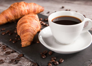 1Breakfast with fresh croissants and cup of coffee